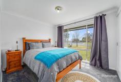  24 Youman Street Guyra NSW 2365 $440,000 - $480,000 Welcome to 24 Youman Street, a well-presented and tidy brick home located in the peaceful town of Guyra. This charming residence offers comfort, style, and practicality, making it an ideal choice for families, first-home buyers, or investors. Inside, you’ll find a beautifully updated modern kitchen equipped with ample bench and cupboard space, complemented by a dining area that creates a warm, inviting atmosphere. The living room features neutral tones, wood heating, and reverse cycle air conditioning, ensuring comfort all year round. The home boasts three generous bedrooms, two of which come with sliding door wardrobes, and all are finished with luxurious plush carpet for added coziness. The renovated bathroom is a standout, showcasing floor-to-ceiling tiles, sleek black fittings, a deep bath, a spacious shower, and a separate toilet for added convenience. Outside, you’ll appreciate the neat, low-maintenance backyard, perfect for relaxation or play, and the added benefit of a solar system for energy efficiency. The single lock-up garage provides secure parking and extra storage space. 