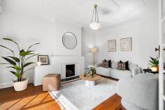  Flat 6/8 St Georges Grove Parkville VIC 3052 $660,000 - $720,000 Elevated and filled with light, this Art Deco beauty offers city convenience in a delightful parkside location. Ideally situated in a private cul-de-sac, this two-bedroom abode is one of only eight in a historic boutique apartment block with Royal Park on the door step. Immaculate and elegant, this appealing property is ideal for downsizers, investors or first-home buyers. Updated with charm and style, the spacious living area boasts soaring original ceilings with plaster mouldings and an ornate fireplace. A balcony with double glass doors opening out on the communal garden floods the space with light and breezes. The chef's kitchen boasts stone benchtops, chic tiled splashback, plenty of storage, stainless steel appliances and a retro meals area with bench seating. The two robed bedrooms both enjoy a leafy outlook thanks to large windows. The central bathroom, renovated with a nod to the Art Deco style, has a combination bath and shower, pedestal basin and a separate toilet. This charming property also features a remote-controlled garage, original floorboards, secure intercom, split system heating and cooling. Walk to the University of Melbourne, The Royal Children's Hospital, The Royal Melbourne Hospital, Melbourne Zoo, Queen Victoria Market, Princes Park, the Royal Parade tram line and the Flemington Bridge Station. 