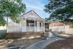  13 Wilga Street Corrimal NSW 2518 $1,450,000 - $1,500,000 This beautifully restored c.1901 Federation cottage blends timeless character with modern elegance, offering a luxurious coastal retreat for relaxed living. Designed to maximise natural light, this home is a must-see! Your Home • Beautifully transformed Federation cottage from 1901, exuding character and charm-ideal for those seeking something special. • Featuring three well-proportioned bedrooms, all with built-in wardrobes, including a master with an ensuite, providing ample space for the entire family. The spacious bathroom, with its oversized corner shower, is filled with natural light. The dream kitchen, with 75mm stone benchtops and a raked ceiling with louvres, offers a bright and airy space for open-plan living and dining. • Flexible access via the front picket fence or rear lane with an electric gate, plus a large, airy granny flat with rental potential of approximately $550 per week. • Enjoy peaceful mornings watching the sunrise from your expansive front deck. • Equipped with reverse-cycle air-conditioning and a security system for added comfort and safety. • Dual street frontage with vehicle access from the rear laneway. • Panoramic ocean and escarpment views from most rooms. • Three spacious bedrooms, with two offering direct veranda access. • Fully fenced, level backyard on a generous 1,012sqm block. The Location • Located in a peaceful street in Corrimal, this property enjoys the serene ambience of the escarpment as well as ocean views while being just a short stroll to the heart of Corrimal. • The township, only moments away, offers a vibrant precinct filled with shops, cafes, eateries, restaurants, services, and major supermarkets. Both private and public schools are nearby, along with a wide range of clubs, soccer fields, parks, and playgrounds. • Corrimal Pool and Library are situated within the township, and the home is close to lifestyle amenities such as Russell Vale Golf Club, the Illawarra Cycleway, Bellambi Boat Ramp, and popular surf beaches including Bellambi, Sandon Point, and Corrimal Beach. • Local bus and train links are easily accessible, and the property provides convenient access to the highway, taking you to Sydney in approximately 90 minutes and the Wollongong CBD in under 10 minutes. 