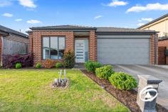  53 Moxham Dr Clyde North VIC 3978 $690,000 - $750,000 Introducing a stunning modern family home nestled in the sought-after Highgrove Estate in Clyde North. This immaculately presented 4-bedroom residence boasts an abundance of natural light and a sense of seclusion. Upon entry, you'll be greeted by a seamless fusion of contemporary design and practicality. The generously sized bedrooms are bathed in natural light, catering perfectly to the demands of modern family living. The open-plan design effortlessly connects the living, dining, and kitchen spaces, providing a warm and inviting atmosphere for both daily activities and entertaining. Throughout the living areas, stylish floating floors create a cohesive feel from the cozy lounge room to the expansive family and meals area. The adjacent modern kitchen is equipped with quality stainless-steel appliances including an oven and dishwasher, stone benches, and a pantry for added convenience. Ducted heating and split air conditioning ensure comfort throughout the year. Outside, you'll find low-maintenance gardens complemented by a double remote garage with internal access and rear roller door. The property is conveniently situated near two shopping precincts offering an array of cafes, chemists, medical facilities, dining options as well as schools. Additionally, well-designed parks and walking tracks are within easy reach for outdoor enjoyment. This is truly a wonderful opportunity to make this exceptional residence your own! 