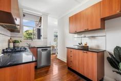  Flat 6/8 St Georges Grove Parkville VIC 3052 $660,000 - $720,000 Elevated and filled with light, this Art Deco beauty offers city convenience in a delightful parkside location. Ideally situated in a private cul-de-sac, this two-bedroom abode is one of only eight in a historic boutique apartment block with Royal Park on the door step. Immaculate and elegant, this appealing property is ideal for downsizers, investors or first-home buyers. Updated with charm and style, the spacious living area boasts soaring original ceilings with plaster mouldings and an ornate fireplace. A balcony with double glass doors opening out on the communal garden floods the space with light and breezes. The chef's kitchen boasts stone benchtops, chic tiled splashback, plenty of storage, stainless steel appliances and a retro meals area with bench seating. The two robed bedrooms both enjoy a leafy outlook thanks to large windows. The central bathroom, renovated with a nod to the Art Deco style, has a combination bath and shower, pedestal basin and a separate toilet. This charming property also features a remote-controlled garage, original floorboards, secure intercom, split system heating and cooling. Walk to the University of Melbourne, The Royal Children's Hospital, The Royal Melbourne Hospital, Melbourne Zoo, Queen Victoria Market, Princes Park, the Royal Parade tram line and the Flemington Bridge Station. 