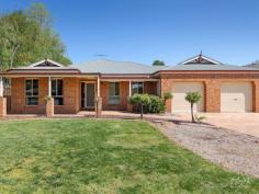  9 Clarendon Ave Wodonga VIC 3690 $745,000 Positioned in one of Wodonga’s most coveted and tightly held estates, our property stands proudly amidst a street of premium homes. Featuring the perfect mix of indoor and outdoor spaces, this spacious home is ideal for families and with a little sprucing, it will come up an absolute treat! Comprising of five bedrooms, the master suite is complete with walk in robe and ensuite. A further four bedrooms all have built in robes and are serviced by the full family bathroom that will cater for the largest of families. A family friendly living arrangement includes a formal lounge on arrival and a grand sized open plan kitchen, living and dining arrangement. The centrally located country style kitchen offers excellent bench space, gas cooktop, electric oven, dishwasher and breakfast bar for informal dining. Outdoors, entertain your guests with ease in under the pitched roof pergola, complete with patio blinds and pot belly heater for those cooler months. The grounds are secure, low maintenance and ready for someone to come along and add their own personal touch. With your comfort in mind, the home has been fitted with evaporative cooling, ducted heating, split system unit and window furnishings throughout and the 6.6kW solar panel system with a 5kW inverter will assist you with your power bills. Additionally, the home also features a double garage with both remote and internal access and a single rear roller door, full laundry facilities and terrific storage options. This home has been well loved, is warm and inviting and a perfect fit for those who don’t mind rolling up their sleeves to reap the benefits. With parks, walking tracks and playgrounds right on your doorstep as well as excellent shopping facilities only a short drive away, we welcome your inspection and genuine offers. 