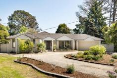  126 Overport Road Frankston South VIC 3199 $1,300,000 - $1,430,000 Framed by verdant lawns and approached through a distinguished return driveway, this comfortable four-bedroom retreat invites large families to gather in a serene sanctuary of space and privacy. Just a leisurely stroll from Derinya Primary School, it promises effortless convenience for family life, while the surrounding neighbourhood delights with local playgrounds, early childhood education, local shops, and accessible public transport. Reflecting just as generous proportions as its large 2,712sqm (approx.) allotment, a light-filled interior delivers a comfortable living experience across two separate living and dining zones, and a central kitchen featuring stone benchtops, a Westinghouse dual wall oven, gas cooktop and walk-in pantry. A rich earthy ambience sparked by the crackle of an open fireplace and raw cedar wall panelling beautifully frames lush garden outlooks at every turn, before a covered deck alfresco takes dining outside. A sprawling expanse of grassy play area nurtures the spirits of young adventurers, inviting endless exploration and joy with space for a swimming pool, if desired. Meanwhile, the practicality of a double garage and double side gates caters to the needs of adults, seamlessly blending functionality with the enchanting charm of family life. Four bedrooms, two bathrooms, a dedicated laundry support the family foundations, with gas ducted heating and two split-system air conditioning units ensuring total comfort throughout. Set well within both the Derinya Primary School and Frankston High School zones, and only a short drive from Frankston's major retail, Mount Eliza Village and convenient freeway access. 