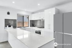  28 Cambridge Circuit Yarrabilba QLD 4207 $700,000 - $750,000 Natural light floods into the kitchen through a well-placed window, making it an inviting and bright space for cooking and gathering. Equipped with a gas cooktop, a substantial pantry cabinet, ample overhead and under-bench storage, and a durable stone countertop, the kitchen offers both style and functionality. Its open layout flows seamlessly into the adjacent living and dining area, creating a unified space perfect for daily family interactions or entertaining guests. The living and dining area, with an efficient air conditioning unit, also extends smoothly to the undercover alfresco area, ideal for hosting larger gatherings and creating a seamless indoor-outdoor lifestyle. The separate media room, situated thoughtfully within the home, offers a versatile space designed for both entertainment and relaxation. Perfect for movie marathons or immersive gaming sessions, this room provides an ideal setting for family movie nights or as a quiet retreat for teens or kids. This adaptable space can easily serve as a multipurpose room, whether as a dedicated family entertainment area, a kids’ playroom, or even a guest retreat if needed. Positioned thoughtfully at the back of the home, the master bedroom offers a private and spacious retreat tailored for comfort and relaxation. This room is equipped with a ceiling fan and air conditioning to ensure year-round comfort, creating an ideal space for winding down after a long day. An attached ensuite provides convenience and privacy, featuring quality fixtures and ample space for daily routines. The walk-in robe enhances the room’s functionality, offering generous storage for an organised and clutter-free environment. This well-designed space serves as a personal sanctuary, perfect for relaxation, quiet evenings, or simply enjoying a private retreat within the home. Bedrooms are designed with comfort and practicality in mind. Each of the remaining rooms features ceiling fans for comfort, built-in robes for organized storage, and are situated conveniently near the main bathroom. The bathroom includes both a shower and a bathtub, catering to both relaxation and functionality, along with a separate toilet for added convenience, located near the bedrooms and main living spaces. The garage offers more than just vehicle storage; it also houses the laundry area, complete with access to the outside, making it easy to manage household chores. An undercover alfresco area overlooks the fully fenced yard, a secure and open space for outdoor activities. A separate patio area adds another option for outdoor relaxation, providing versatility for different outdoor gatherings. A double remote-control garage completes the home, adding secure parking and additional storage solutions, ensuring every aspect of the home is thoughtfully designed for functionality and comfort. Property Features: •Built in 2017, offering modern finishes and design •Well-appointed kitchen featuring a gas cooktop, large pantry, ample cabinetry, and a durable stone benchtop for both cooking and entertaining ease •Open plan living and dining area with air conditioning, providing a comfortable and inviting central space that flows effortlessly into outdoor areas •Separate media room designed for flexible use, ideal for family movie nights, gaming, or as a quiet retreat •Private master bedroom equipped with air conditioning, an ensuite for convenience, and a generous walk-in robe for organised storage •Additional bedrooms with built-in robes and ceiling fans for enhanced comfort and storage •Main bathroom with a separate shower and bathtub, plus an adjacent toilet, offering functional convenience for families and guests •Undercover alfresco area that seamlessly connects with the indoor spaces, perfect for year-round outdoor dining and entertaining •Separate undercover patio area, providing additional outdoor space for relaxation or social gatherings •Double remote-control garage offering secure parking and additional storage space •Fully fenced yard, creating a safe and private outdoor area ideal for families, pets, or personal enjoyment 