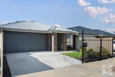  125 Keane Ave Munno Para West SA 5115 This fully fenced, well-maintained and presented home offers a comfortable lifestyle with three generously sized bedrooms, each equipped with built-in wardrobes. The master bedroom provides added luxury, featuring a walk-in robe and private ensuite. The home is tiled throughout for easy maintenance and includes two spacious living areas, ensuring ample room for relaxation and entertainment. The kitchen is the heart of the home, overlooking the meals area and family room, perfect for hosting gatherings or enjoying family time. A large laundry and a separate bathroom add to the functionality of this practical layout. Outside, the property features a double carport with an electric panel door, providing secure parking, along with a rainwater tank. The established gardens and outdoor entertaining area create a serene environment for alfresco dining or relaxing outdoors. Energy efficiency is maximised with a 12.5 kW solar system, complemented by a 10 kW battery and two inverters, ensuring sustainable living. Situated on a 299m² (approx.) block, this home is ideally suited for families or those looking to downsize without compromising on comfort. Ready for you to move in, this home is perfect for creating lasting memories. 