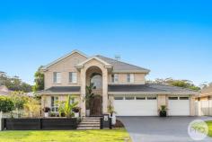  97 Bagnall Beach Road Corlette NSW 2315 Sprawling over a 700m2 parcel of land sits this immaculately presented double story home, perfectly suited to family living. Positioned in the highly desirable suburb of Corlette, the home sits proud along the street and is a standout. Upon entry, and you are welcomed by light and bright interiors along with a neutral colour palette. The home has stylish tiled flooring, ducted air conditioning and multiple entertaining options to relax and unwind from a busy day. Walk through, and you have the spacious and plan living dining areas that flow seamlessly from the gourmet-style kitchen. Continuing on to your large, covered outdoor entertaining area this home has everything you will ever need and more! With 7 bedrooms of accommodation, and 3 bathrooms, the property is appealing to families needing space and privacy. Featuring: - Triple lock up garage, plus drive through access to the yard and additional off street parking with ample driveway space - Gourmet-style kitchen area - Expansive outdoor undercover entertaining area - 7 spacious bedrooms with 3 bathrooms - 3 separate internal living areas - Expansive master suite with spacious ensuite including spa bath - Large, level backyard - Ability to have multi-generational living with this unique floor plan - Situated approximately a 3 minute drive to Salamander Bay Shopping Centre, Bagnall's Beach and surrounding schools 