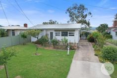  27 Punyarra Street Werris Creek NSW 2341 This charming two bedroom, one bathroom home is perfect for those seeking a comfortable and convenient lifestyle. This cozy little home features a well-appointed kitchen with plenty of storage, a large living area, plus an additional living/entertaining space. Containing a functional main bathroom along with two generously sized bedrooms, both complete with built in wardrobes and ceiling fans. Other features include two reverse cycle systems located in both living areas, a single carport and a huge backyard with stunning views overlooking the mountains. Situated in the heart of Werris Creek, close to shops, schools, medical facilities and public transportation. Enjoy the convenience of living in a vibrant community whilst still enjoying the tranquility of a peaceful neighbourhood. 