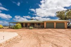  29 Drabble Road Waggrakine WA 6530 $1,190,000 Is there anything missing here? Big house, Huge sheds, plenty of land, Pool, Games room/Bar with amenities, views and still close to Geraldton. This is the ideal place for an active family who will relish the lifestyle living on a 10 acre property with all the incredible extras on offer here. • 3.75 Hectares and ideally located on a corner to allow an easy subdivision into 2 lots if desired. • Double Brick & Colourbond home built around 1990. • Classic Homestead style with Verandahs all around. • 4 Good sized bedrooms in the main house. • 2 Bathrooms with the ensuite having a full recent renovation. • Separate office. • Huge central lowered living area with wood fired heater. • Games room that opens to the outside. • Kitchen with a beautiful outlook with plenty of space, wide fridge recess and 900 appliances. (Gas bottles) • Ceiling fans and air conditioners in several rooms in the house. • Solar Hot Water with electric booster. • Double garage with direct entry into the home. 7.5mt x 7 mts to take larger vehicles easily. • Large below ground pool. • Patio/BBQ area overlooking the pool. • "Dribblers Inn". 9mt x 15 mt separate Games/Bar room with amenities that could possibly be made into a flat. • 240m2 shed with high doors, concrete floor and power. An absolute beauty! Garaging for 10 plus cars! • 22 Solar Panels. • NBN, Mains power and water and Septics. All this plus the excellent views across to the City and coastline and still just 10 minutes from thriving Geraldton and 5 minutes from the beach and Glenfield shopping centre. 