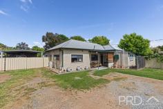  69 Blowering Road Tumut NSW 2720 $529,000 Privately positioned on the very edge of town and set upon a generous allotment, sits this three-bedroom, two-bathroom solid block home with great shedding and ample space for the kids to play. Just a short drive to the Tumut retail centre and walking distance to local schools and community facilities, this three-bedroom, two-bathroom family home is sure to not last long. Call today to book your inspection! Premiere Features: - Three great size bedrooms with ensuite privately positioned off the master bedroom - Main bathroom offering combined shower over bath and single vanity - Ensuite with floor to ceiling tiling boasting shower, toilet and single vanity - Open plan living and dining area, flowing directly to the kitchen and all serviced by reverse cycle split system air conditioning, wood box fire heater and ceiling fan - Sun filtered kitchen with gas cooktop, stainless range hood and dishwasher, ample cabinetry and mobile "butchers block" style island bench with built in cabinetry and ceiling fan - Additional rumpus area or sunroom positioned to the back of the plan, with direct external access - Internal laundry positioned off the sunroom and boasting a second toilet - Rear fully covered paved entertaining area overlooking the rear yard - Large fully fenced and private rear yard with ample garden shedding - Double bay colourbond shedding with additional double carport fenced off in the rear yard with light and power options - Large low maintenance front yard - Solar power connected - Generous approximate 1,490m² allotment with the home positioned privately toward the rear and in close proximity to all major services and amenities - Property is currently tenanted until 14th March 2025 Do not miss your opportunity to secure this three-bedroom family home, privately positioned on the very edge of town. 