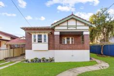  23A Gallipoli Street Hurstville NSW 2220 Set in an elevated position and in a quiet tree lined street, this full brick home is ideal for any young family or downsizer looking for a single level home in an ultra convenient location. Full of character and charm, the home has been tastefully updated with high ornate ceilings, polished timber floors and low maintenance yard that's ideal for entertaining. Located within close walking distance to Hurstville Station, Shops and Schools. Property Features: Separate lounge and dining rooms Light filled rooms, stain glassed windows, picture rails & air-conditioning Three large bedrooms, master with built-in and ensuite Modern kitchen with gas cooking and stone bench tops Side access for multiple vehicles to carport 