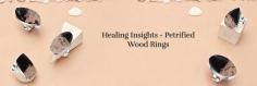  Do you want a ring that features a gemstone as old as the dinosaur? If yes, then you must have a look at petrified wood rings . Petrified wood is a fossilized gemstone whose origins can be traced back to the Mesozoic Era and Paleozoic Era, an era about 250 to 66 million years ago. 