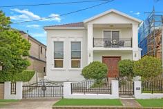  214 Carrington Avenue Hurstville NSW 2220 This architecturally designed double-brick home, grand in scale and bathed in natural light, embodies the essence of modern family living. Centrally positioned in the heart of Hurstville, it features a versatile layout with multiple formal and informal living spaces and seven oversized bedrooms, offering an impressive sense of space. The contemporary kitchen is equipped with gas cooking, an oven, a dishwasher and abundant cupboard and bench space. Seamlessly connected to the dining and lounge area with soaring high ceilings, this space is ideal for family living and entertaining. This home is a true standout, offering exceptional space, comfort and convenience. Key features: Expansive formal lounge with a striking 5.6 meter high ceiling Open-plan kitchen with gas cooking and ducted reverse cycle air-conditioning Spacious living and dining areas leading to a North-East facing backyard Seven bedrooms, including two with en-suites, all featuring built-in wardrobes Luxurious master suite with a walk-in dressing room and private balcony Remote-controlled double lock-up garage plus two storage rooms Located in a quiet street in Hurstville, close to schools, shopping and transportation 