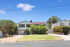  22 Stinton St Mandurah WA 6210 $699,000 This character-filled two-story home offers the perfect blend of space, comfort, and exciting potential. Nestled on a large block, this property provides an ideal setting for growing families, savvy investors, or those seeking a charming holiday home. The home features four spacious bedrooms and two bathrooms, providing ample room for family living. Downstairs, you'll find a separate lounge room that creates a cozy, inviting space for relaxation, while the open-plan dining area flows seamlessly onto a charming front portico - perfect for enjoying morning coffees or watching the world go by. Upstairs, the kitchen is both spacious and functional, with wooden French doors that open out onto a balcony overlooking the massive backyard. Whether you're cooking or enjoying the view, this is a space that truly connects indoor and outdoor living. Parking and storage are never an issue with this property. The drive-through garage provides easy access to the rear and a workshop. While the side access leads to a large shed, complete with three roller door entries. This generous storage space offers plenty of room for tools, hobbies, or additional vehicles. The large block of land provides endless possibilities, including exciting development potential. Whether you're looking to expand the existing home, build additional structures, or explore other opportunities, the potential here is significant. Located just a short distance from town and close to transport links, this property offers the ideal balance of convenience and tranquility. Whether you're seeking a permanent residence or a holiday home, this home offers versatility and great value. 