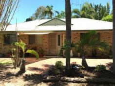  1 Tammy Rd Moore Park Beach QLD 4670 $ 695,000 Set upon 5 acres in a peaceful estate of similarly sized land portions lies this tidy three-bedroom brick home. This superb house and land offers an acreage lifestyle opportunity close to the beautiful Moore Park Beach, Kolan Boat Ramp and is still within a short drive to Bundaberg. This home features a comfortable open plan dining and lounge area which is air conditioned for year- round comfort. The three bedrooms feature built in robes, ceiling fans and are quite spacious. The kitchen has plenty of bench and cupboard space and has a servery to the dining area. For those long summer afternoons, there is a large paved and covered area off the lounge area which would be ideal for the family BBQ or entertaining friends. With 12 solar panels generating approximately 2.4KW of power, you should be almost self sufficient in your power needs. There are 2 massive rainwater tanks for all your domestic water needs. Outside, there is a larger than average single lockup garage for vehicle needs and workshop space. Book a inspection today,as this wont last long !! 