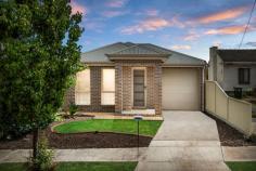  41A Albany Cres Oaklands Park SA 5046 $849,000 - $899,000 This beautifully designed modern courtyard home offers the perfect blend of style, comfort, and low maintenance living in the heart of Oaklands Park. Ideal for first-home buyers, downsizers, or investors, this home provides convenience and practicality while being just moments from amenities, schools, transport, and major shopping centres. The home’s functional layout features an open-plan living, dining, and kitchen area at the rear, creating a light-filled space perfect for relaxing or entertaining. The modern kitchen is well-appointed, offering ample bench space and storage to make cooking a breeze. The master bedroom is a true retreat, complete with a walk-in robe and private ensuite. Two additional bedrooms, both with built-in robes, are serviced by a central bathroom with a bath, ensuring comfort for the whole family. A separate laundry adds further practicality to the home. Step outside to the inviting alfresco area, perfect for entertaining guests or enjoying your morning coffee. The low-maintenance rear yard provides enough space to enjoy outdoor living without the hassle of constant upkeep. Additional features include ducted reverse-cycle air conditioning for year-round comfort and a secure single garage with internal access for added convenience. Situated in a prime location, this home offers easy access to public transport, local schools, and Westfield Marion Shopping Centre, as well as nearby parks and recreational facilities. This modern, move-in-ready home delivers the perfect combination of lifestyle and location, making it an opportunity not to be missed! 