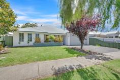  6 Harrow Terrace Vasse WA 6280 Just one street back from the tree-lined local primary school in the heart of Vasse Newtown, is this idyllic 4-bedroom, 2-bathroom family home just 600m from the Village Shopping Centre and 3kms to the beach in the other direction.  This lovely home was built in 2010 with quality materials and fine finishings. It presents nicely to the street with its green lawn, mature prunus tree and raised garden bed complimenting the colonial-style windows and enclosed front porch. To the right of the home is a double garage nicely paved to the verge.  Inside is a spacious open-plan layout with the kitchen, living and dining rooms all serviced in winter with a wood fireplace in the corner. There is also a separate study.   The kitchen comes with walk-in-pantry, double wall-oven, natural gas cooktop and direct access to the huge, enclosed, private alfresco with border garden - brilliant for the summer months and entertaining generally.   The master bedroom is fitted with stylish 'Hamptons' shutters and has its own ensuite with a large, deep corner bath. Minor bedrooms are a good size and share the second bathroom. All bedrooms have built-in-robes. The theatre room and bedrooms are carpeted, while main traffic areas in the living/dining area have durable timber-look vinyl planking in a warm oak finish to match the neutral tones of the walls and window fixtures. The neat laundry has access to the outside line, there's a patch of green lawn alongside the alfresco for the kids/dog, rooftop solar panels to help with energy costs and generally low-maintenance gardens to minimise fuss.   Sitting on a generous 561sqms, this terrific home in vibrant Vasse offers the very best of South West living.  Features:   • Inviting entrance hall introduces your guests to warm living  • 4 generous bedrooms and 2 bathrooms • Master bedroom with dual robes plus separate toilet, dual vanities and large, deep bath to ensuite  • 4 different living areas including central living, separate office/study and theatre room  • Expertly planned kitchen for efficiency and easy care, featuring soft closing doors and draws, built-in-pantry, double wall oven, gas cook top, stainless steel range hood and dishwasher  • Ducted evaporative cooling throughout the home with 2 gas bayonets for heating  • Enclosed North-facing alfresco, great for summer and winter entertaining  • Quality shutters and window treatments throughout  • French doors  • Solar panels   • 3 x TV points   • Double garage with internal access  • Fully insulated  • 561sqm fully fenced with established, easy care gardens retic to lawns  • Bore for the gardens 