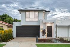  18A Shelley Ave Fulham Gardens SA 5024 Executed to perfection by Rossdale Homes, this brand new two-storey beauty is as high quality as they come. A contemporary but timeless northerly-aspect façade makes a wonderful first impression from the street, and it's every bit as sleek inside, an airy open plan dining, living and kitchen space a worthy heart of the home on the ground floor. With a gorgeous neutral palette, the clean-lined kitchen is fully equipped with stone benchtops, a huge island with breakfast bar, double sink, dishwasher and feature lighting, along with a gas cooktop, window splashback and all the storage space you could ask for. Under the protection of the main roof, a charming alfresco space overlooks an easy-care courtyard with raised garden beds. A convenient lower-level master suite boasts a luxurious ensuite bathroom with dual vanities, full-height tiling and huge shower, a further three bedrooms on offer upstairs along with an invaluable second living space which catches beautiful natural light courtesy of big picture windows overlooking the street. A full-sized family bathroom with huge shower, inset bath and convenient separate w/c completes the first-floor. More you'll adore: - Ducted reverse cycle air conditioning - Separate laundry with external access - Study nook - Double garage with internal access + off-street parking - Torrens Titled - Fully Irrigated backyard A top spot within walking distance of Fulham Gardens Shopping Centre, surrounded by an array of local reserves and schooling options and less than 3kms from popular Henley Square and beaches. City commutes are a simple 10kms. There's nothing quite like brand new. Fulham Gardens is calling you. 