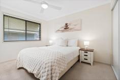  3/38-40 York St East Gosford NSW 2250 Discover a perfect blend of comfort, style, and convenience in this light-filled East Gosford townhouse. Positioned within a boutique complex of eight, this home offers an exceptional lifestyle, ideal for first-home buyers, downsizers, or investors seeking a sought-after location. Features include: – Two spacious bedrooms with plush carpet, built-in wardrobes, and ceiling fans. – A bright, modern bathroom featuring a bath, a separate shower, and a second WC downstairs for added practicality. – Open-plan living, dining, and kitchen areas flowing seamlessly onto an undercover balcony, ideal for entertaining or relaxing. – A well-appointed kitchen with easy-care laminate benchtops, a dishwasher, and ample cabinetry. – Split-system air conditioning, downlights, and floating laminate flooring enhancing the living space. – North-facing, fully fenced back patio, partially undercover and framed by lush greenery with a practical paraline clothesline. – Double electric garage with through access to the north-facing patio. – Laundry with external access for convenience. Set within walking distance of East Gosford’s charming cafes, shops, and the vibrant Gosford waterfront, this townhouse combines modern design with a location second to none. Enjoy easy access to the M1 motorway, railway station, and quality schools, making it a lifestyle opportunity you won’t want to miss. Don’t miss your chance to secure this impressive home. 