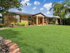  11 Honeysuckle Court Walloon QLD 4306 $749,000 For sale in the Suncrest Estate, a very poplar part of Walloon, is this well maintained home on 1/2 acre waiting for the perfect family to come in and start their new life here. This very tidy lowset brick home has an open plan lounge with a bay window and tiles throughout. Off that are the dining area and the kitchen with gas cooking and views out to your large back yard with fully dog proofed fences so you can feel at ease with the kids and pets running around freely. The 4 bedrooms are all a good size and come equipped with full length built-ins with mirrors and stainless steel ceiling fans. The bathroom has been modernised in tasteful neutral tiles and there is a convenient separate laundry. Outside you have a covered entertainment area that runs the full length of the house, just perfect for relaxing with friends and family hosting those summer BBQ's. Out in the yard, however, is the most fabulous entertainment firepit - made to look like stables, but perfect for an outdoor kitchen or bar. Out the side of the house is a extra high double carport with access to the back so you can bring the caravan and park it out in the yard. To the rear of the yard is a 6 x 6m lock up shed that should come with every home these days. All ready for you just to move into or priced extremely well that if you wanted to add a 2nd bathroom or another living space you could do so and not break the budget. Walloon is a very popular lifestyle location, offering a peaceful family friendly atmosphere, convenient access to Ipswich CBD, Rosewood CBD, and wide range of facilities including shopping centres, pubs, cafés and retail options. Walloon has its very own primary school and is very well serviced by public transport. With handy access to the Warrego highway, Cunningham highway and the commuter train to Brisbane means that Walloon is quickly becoming a savvy location for buyers wanting to purchase into a rising market. 