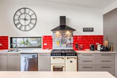 3 Anchorage Way Goughs Bay VIC 3723 $960,000 - $1,050,000 Discover an unparalleled lifestyle at this captivating lakeside property in picturesque Goughs Bay. Combining modern comfort, vibrant design, and the beauty of nature, it's the perfect place to relax, entertain, and enjoy life by the water. Step inside and you're welcomed by a sense of space and contemporary style, with soaring clerestory windows and glass doors flooding the home with natural light. The kitchen is a true standout, showcasing bold red subway tiles, quality appliances, and a generous island bench - perfect for casual meals or entertaining. The living room completes the picture, inviting you to unwind by the wood fire on cooler evenings, or step straight outside when the sunshine calls. Accommodation is thoughtfully designed, offering three spacious bedrooms. The master enjoys its own private retreat upstairs, complete with a walk-in robe, ensuite, and a dedicated living area that flows onto a deck - an ideal spot to soak in the sweeping lake views. Outdoors, the lifestyle continues with a tranquil setting overlooking the beautifully landscaped gardens and surrounding mountains. Picture mornings with coffee on the deck, evenings entertaining friends and family, and plenty of room for all the toys with ample parking for cars, a caravan, and even the boat. At the rear, gated access to a reserve leads to a lock-up shed, perfect for storage or tinkering. Adding to the magic, friendly kookaburras visit daily, reminding you that you're immersed in nature. Perfectly positioned to enjoy all that Goughs Bay has to offer - from boating and fishing to hiking and exploring - this property is more than a home, it's a lifestyle.