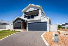 189 Glenfield Beach Drive Glenfield WA 6532 $989,000 If you are looking for an upmarket investment or not quite ready to move into your dream home or maybe you are considering building, this may be the perfect property for you. A secure lease will be in place until the end of June 2027, so buy now at today's prices and secure this stunning home and location for later. • Built in 2020 • 644 sqm block • 4 bedrooms with 3 bathrooms • The 3rd bathroom is for the 4th bedroom and has its own Lounge area, plumbed in sink for tea/coffee area and also a side gate with an enclosed area for privacy if visiting. • Ideal for a family requiring some independent living or even to lease out. • Impressive central Kitchen that overlooks the family and dining area. • Master room with WI Robe, ensuite with large shower, vanity and separate toilet • Bedrooms 2 & 3 have Built in Robs and ceiling fans. • Theatre room with a study nook. • Double Garage with direct entry. • Seperate shed with roller doors at both ends. • 2 Driveways. • Minimal garden. • Great looking below ground pool sheltered away from strong winds. • Spacious Alfresco overlooking the Pool. • 40 solar panels • Ducted Reverse Cycle Air con • Upstairs is a games/ bar room and a lovely balcony with ocean views • City Rates $3580 p/a approx • Water Rates $1604.00 connected to deep sewer This is such an impressive home near the beach in one of Geraldton's most sought after areas and less than a 15 minute drive into the City Centre. Viewing really is a must!