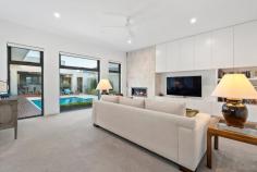 15 Relph Ave Portsea VIC 3944 This is a rare and unparalleled opportunity to acquire this outstanding home with stunning golf course views. The experience begins at the front gate leading to a beautiful low maintenance garden and Gosford stone entry immediately capturing views from the front door. Architect designed with timeless high quality finishes, this light filled home with high ceilings comprises of 4 generous bedrooms, 3 with ensuites and family bathroom including master with garden aspect. Kitchen living dining all capturing golf course views and integrating to outdoor entertaining area with north facing solar and gas heated pool and surround sound. Championship size tennis court, 48 Solar panels on the roof and double garage with internal access. Front and rear lighting and two gas fireplaces. Second living area with pool aspect and many extra features to enhance this home. Just in excess of 1738 sqm on two titles this multi generational single level home will make memories for years to come.