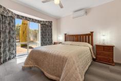 7 Vineleaf Street Mildura VIC 3500 $599,000 - $658,900 Tucked away in a tightly held, house-proud pocket just moments from Mildura Central and the Fifteenth Street shopping precinct, this immaculately presented home delivers the low-maintenance lifestyle so many buyers are chasing, with the added bonus of strong investor appeal. Behind the neat street frontage and established gardens, you'll discover a beautifully kept three-bedroom, two-bathroom residence where every detail has been carefully maintained. The main bedroom enjoys its own ensuite and walk in robe, while the remaining bedrooms are well-sized and serviced by a central bathroom. Living spaces are light filled and practical, flowing from the welcoming lounge through to the open-plan kitchen and dining area, ideal for everyday living or relaxed entertaining. Year round comfort is assured with evaporative cooling throughout plus four split systems, allowing you to zone the climate for different rooms and keep everyone happy through Mildura's warm summers and cooler nights. Step outside and the appeal continues, with a quality Spanline outdoor area creating a sheltered second living zone for weekend barbecues, family catch-ups or a quiet coffee in the morning sun. Automatic sprinklers front and back keep the gardens looking sharp with minimal effort, while secure fencing and excellent off-street parking provide peace of mind. It's very much a "lock up and leave" lifestyle, freeing up your time to enjoy Mildura's shopping, cafés, schools and transport, all conveniently close by. For investors, this address ticks all the boxes: a solid, low-maintenance home in a consistently popular street with a proven track record for quality rentals and solid yields, supported by strong demand in this convenient, amenity-rich pocket. Whether you're downsizing, investing or making a savvy first move, this property offers a standout combination of comfort, security and lifestyle in a highly regarded location.