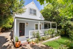29 Lakeview Avenue Blackheath NSW 2785 $1,150,000 - $1,250,000 Whether you're seeking a tranquil weekender or a beautiful home to enjoy every day, this immaculate character cottage offers the perfect blend of warmth, style, and practicality. Presented in as-new condition, the home features painted timber cathedral ceilings, plantation shutters and an extremely efficient gas heater in the lounge room in the cooler seasons. Light-filled interiors open to a generous entertaining deck that flows effortlessly from the kitchen, ideal for relaxed gatherings with friends and family. Wrapped by wide verandahs and framed by an established garden brimming with David Austin roses, the property exudes timeless appeal and privacy. The 929m² (approx.) block includes a long driveway to the rear garage, complete with a versatile sleep-out room - perfect for a studio, workshop or guest accommodation. Recently painted inside and out, every space has been thoughtfully designed to maximise comfort and liveability. Located in a quiet street just a short 900m and approx. 10 minute stroll from town, this romantic mountain cottage delivers form, function, and style in equal measure. Breakdown of Features: Immaculate character cottage in as-new condition Painted timber cathedral ceilings and plantation shutters Extremely efficient gas heater for warmth in cooler seasons Wide wraparound verandah and rear entertaining deck from kitchen Ample natural light throughout and clever bespoke storage cabinetry Stylish contemporary bathroom on ground floor with hidden laundry Two bedrooms on upper level with access to 2nd shower bathroom 929m² (approx.) established block with cottage gardens Dual garaging with versatile sleepout/studio or workshop space Quiet, private setting with long driveway and additional parking 900m easy walk to town, cafés, local conveniences & city train links