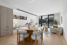 1/5 Wazir St Bardwell Valley NSW 2207 $1,800,000 - $1,900,000 Family Duplex Showcases Rare Refinement with Contemporary Style and Comfort Clever design and elegant finishes have created a family living environment of undeniable class and comfort in this sleek, as-new duplex. Making an instant impression from the street, the striking two-tone brick facade is accented with hanging greenery and landscaped gardens. Stepping inside, the effortless sense of style continues with timber flooring, tall ceilings and sleek on-trend appointments, while the prime north west to rear aspect ensures superb natural lighting throughout. There are up to five bedrooms to cater for growing families, with a gourmet gas kitchen and multiple alfresco settings adding immense appeal for entertainers. Quietly positioned but still close to everything you could need, this magnificent home is just 250 metres from Athelstane Public School and 400 metres from Arncliffe Park and playground. There's also easy walking access to two different train lines - a 900 metre stroll will take you to Turrella Station, and Arncliffe's main street shopping strip and station are both 1.1 kilometres away. • Engineered timber floors and high shadowline ceilings • Modern design fuses living, dining and kitchen spaces • Tall sliding glass doors ensure seamless flow to terrace • Barbecue kitchenette for easy all-weather entertaining • Sunny level lawn leads to raised carport/alfresco setting • Sophisticated stone island kitchen features gas cooktop • Four upper bedrooms with robes, ground floor fifth/study • Main has dual rain shower ensuite, desk, private balcony • Balcony captures elevated outlooks over neighbourhood • Refined family bathrooms on both floors, one with bath • Ducted a/c, abundance of storage including under stairs • Rear lane access to secure paved carport from Gipps St • Carport offers great versatility as extra entertaining area • 500m to Wollongong Rd village, 1km to Forest Rd shops • 1.1km to waterside parklands and trails along Wolli Creek • 2km to Wolli Creek's dining precinct, station, Woolworths