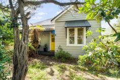 20 Carysfort Street Blackheath NSW 2785 Rich in traditional detailing and timeless appeal, this classic circa 1910 weatherboard cottage offers a wonderful blend of character and modern comfort. Showcasing new deluxe vinyl insulated plank timber flooring, timber-lined walls and beautifully preserved original features, the home is filled with warmth and personality throughout. Set in a highly sought-after, tree-lined street just moments from the village, the property also benefits from a renovated kitchen with quality appliances, a versatile rear sunroom or dining space, and an enchanting park-like garden, creating an inviting and highly liveable mountains retreat with outstanding future potential. Summary of Features: Charming circa 1910 weatherboard cottage in a quiet, tree-lined street Premier location approximately 800m from Blackheath village and railway station Welcoming entrance hall with solid doors and lead-light glass detailing Renovated kitchen with quality appliances and excellent functionality Double glazed windows to rear of home Stylishly renovated bathroom Large and versatile sunroom/dining area overlooking the garden Central lounge room with slow combustion fireplace Deluxe vinyl insulated plank flooring, high ceilings, picture rails, sash windows and timber-lined walls New ducted natural gas heating for year-round comfort Approx. 919 sqm park-like garden block, offering privacy and a tranquil setting Offering original charm, modern updates and an exceptional location, this character-filled cottage presents a rare opportunity to secure a truly unique home in one of Blackheath's most sought after streets.