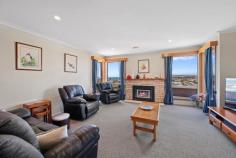 126 George St Devonport TAS 7310 $910000 Position and Versatility, Productivity and Visual Appeal 126 George Street would have to be among the best positioned homes in Devonport. Positioned to desired facilities, positioned to view Bass Strait, the city lights, the river mouth, the Western Tier mountain range. Set just below the crest of George Street overlooking the estuary of the Mersey River meeting Bass Strait with elevated views along the coast beyond Wright and Egg Islands and Moorlands and Northdown Beaches. This is a must see property if you are seeking prime property and location. Within 150 metres from St Brendan Shaw College, under a kilometre of Nixon St Primary School, Devonport High School, The Four Ways, Byard Park Sports complex, Devonport Surf Life Saving, Bluff Beach, Coles Beach, and only 1.7 kilometres to the City Centre; all within walking distance for an active family and convenient to all local schools and shopping precincts and recreation facilities. Such a versatile household, boasting at least four bedrooms, a family bathroom and two ensuites, studio/office options, formal lounge and 2nd living/rumpus. The house comprises two floors each with private access and vehicle accessways. The versatility extends to the living options beginning with access and convenience of all the essentials being on one level. Most two storey homes you enter and then climb; at 126 George you drive in, walk in and settle in; you may then proceed downstairs as necessary, however downstairs also has its own garage (with remote access), so on both levels you can drive in, walk in and settle in. When ready walk upstairs to the hub of the house which is the open plan kitchen-dining-living area and decking with the most captivating and expansive views. The views from the property are captivating in all weather conditions, at all times of day, and any time of year, from inside through the generous window area or outside on the deck or in the garden. Whether it be at sunrise over the coast as Devonport comes to life and the Spirit arrives from the horizon and enters the estuary to dock; during the day watching yachts in the strait sailing the breezes or at dusk as the city lights take effect and The Spirits’ of Tasmania glide back into Bass Strait lit up like a Christmas tree to slowly disappears toward the mainland. The current owners are active gardeners and the gardens are established with terraced levels featuring ornamental beds to the front of the house, while the secure gardens to the rear of the house are tended grow an abundance of fresh vegetable and fruit produce year round as they are in season. The easterly aspect and slope captures all the early morning sun and the position provides natural shelter from the prevailing south-westerlies the northern house front created a suntrap to help ripen the fresh produce. Produce grown includes runner and broad beans, cauliflower, leeks, rhubarb, cabbage, lettuce, spinach, tomatoes, corn, carrots, parsnips, cucumber and zucchini; Fruits include apples, fig, apricots, lemons, red currants and grapes. A new owner does not have to be as green fingered, but all the elements are in play. The property is situated on a moderate gradient, but the garden areas have been raised and terraced for ease of management and tending. This brick built and tile roofed house (Circa 1972) has had numerous upgrades during the current owners tenure including upgrading of the family bathroom, and second ensuite, new entry doorway, new glass balustrade to the deck, new flooring to living areas, and carpet to bedrooms, upgraded inbuilt robes, new roofing to carport, new down lights in the two living rooms plus kitchen and dining room, freshly painted interior where required, new gas hot water unit and as mentioned terracing and creation or renewal of raised garden beds for produce, and renewed front fences. The residence is both bright, well lit and ventilated as you would expect in a residence established to capture the scenery and surrounds, warmed when necessary by fan forced gas fire heater and supplemented when needed with ducted heating. The kitchen features electrical appliances – range, oven and dishwasher, plus walk in pantry. Set up an easel on the deck and paint or photograph the views, or sequester yourself at the house or on the deck with friends and family over a glass or cup of your favourite beverage and enjoy at your favourite time of day. This is a home for people who like to look outward, no need to shut the curtains if you like to wake with the sunrise. It is ideally suited to family living, provides generational family living opportunity, running a home office or studio; the options are enormous. Sushames Real Estate trusts in the information in this document which has been sourced from means which are considered reliable. Prospective purchasers are recommended to carry out their own due diligence regarding permits, measurements, and boundary positions prior to settlement. Inspections are strictly by appointment only. Please contact Neil on 0429 331 664 for further information. Features Balcony Ducted Heating Fully Fenced Gas Heating Remote Garage