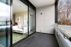 114/44 Gillies St Fairfield VIC 3078 EOI $400,000 - $440,000 Expressions of Interest Closing Wednesday 12 August at 5pm Contemporary unit, walk to station & cafes Brilliantly positioned in the acclaimed 'Greenwich' complex, this sophisticated one-bedroom apartment delivers the ultimate in vibrant inner-city living. Securely tucked away yet offering immediate doorstep access to Fairfield Station, an on-site ground-floor café, and a lush communal garden, the location is simply unmatched. Inside, contemporary timber-look flooring anchors a superb open-plan meals and living zone. Seamlessly flowing out to a private balcony, it offers the perfect layout for morning coffees or effortless evening relaxation. The masterfully designed entertainer’s kitchen serves as the home's striking hub. It showcases premium stone benchtops, a versatile island bench, a dual-tone palette of crisp white and warm timber cabinetry, a gas cooktop, a dishwasher, and a sleek integrated fridge. Rest and relaxation are assured in the generous bedroom, complete with a massive built-in robe. It is well-serviced by a huge, fully-tiled bathroom boasting premium floor-to-ceiling tiling and a large shower. Further highlights include a clever European laundry, split-system heating/cooling, a dedicated undercover car space, a handy storage cage, a bike shed, and ample guest parking. Embrace a life of total convenience. You are just steps away from the iconic Station Street Shopping Village, bustling cafes, gourmet grocers, and the scenic Yarra River walking trails. It is an exceptional opportunity for first-home buyers, professionals, and savvy investors alike.