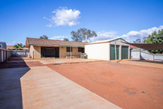 31 Acacia Way South Hedland WA 6722 $625,000 AN OPPORTUNITY NOT TO BE MISSED !!! Not often does the opportunity to secure a solid 3 bedroom home set out on a 660m2 fully fenced block in this price range come along that is just waiting for your own personal finishing touches to make this your ideal Pilbara haven. Already packed full of desirable features like the large below ground pool, like the large double lock-up garaging, like the dual access drive ways with sliding gates like the solid block 3 bedroom house, it is all here and just waiting for you to put your finishing touches to it. Renovate and decorate inside to make this property exactly the style you desire and take your time to landscape the exterior at your own pace to create the perfect outdoor living oasis overlooking the below ground pool for year round enjoyment. In the meantime just relax and enjoy all that is here until your have completed your plan to transform this house into your own Pilbara dream for years of enjoyment to follow. Vacant possession available on settlement !! Features Include: *Fully Fenced Yard *Dual Access Drive Way With Sliding Gates & Parking Galore *Large Below Ground Pool *Large Double Lock Up Garaging *Solid 3 Bedroom House *Split System Air Con Throughout *Security Screens *Walking Distance To Cassia Primary School *Desirable Location For further details and your appointment to view call Bruce on 0409 770 272