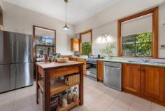 112 David St East Devonport TAS 7310 $845,000 Timeless Circa 1888 Character Home on 1,234 m2 – A Rare East Devonport Gem Step back in time while enjoying modern comfort at 112 David Street, East Devonport. A beautifully preserved circa 1888 residence set on an expansive 1,234 m2 block. This charming four bedroom home blends historic elegance with thoughtful updates, offering space, warmth and lifestyle in equal measures. The home retains its classic character while offering the comfort and presentation today’s buyers seek. Garden & Lifestyle: A full-length picket fence offers additional privacy as well as being child and pet safe, a double carport adjoins a private deck area for early morning coffee or just to contemplate the day ahead. This property offers not just a home, but a lifestyle – space to grow your own produce, enjoy nature and relax in complete privacy. The lounge / living is of two components, features classic high ceiling lined in Tasmanian Oak. Quality block out drapes, as new carpet and painted with a neutral colour platelet throughout the home. The second living / lounge offers a more contemporary setting with lower ceiling, down lights and expansive windows leading to the huge deck area that overlooks the garden. The light and airy timber kitchen has gas cooking, as well as huge meal preparation areas, Ariston dishwasher plus ample room for a double refrigerator. The large adjoining dining area features ornate fireplace with desk alcove and multiple shelving for those special ornaments. There are two heat sources within the home, the hallway has a Mitsubishi reverse cycle air conditioner, the dining and lounge rooms have online gas. Sixteen solar panels and 3.7 kw inverter assist in reducing electrical consumption. The bedrooms are wide, spacious, spectacular polished floors, high ceilings as well as built ins in most rooms. Fireplaces are ornamental but could be reinstated should you choose. Bathroom/ Laundry, Powder room: All have been rebuilt over the last few years, tastefully furbished with classic features and authentic timber windows Homes of this era, on land of this size, are increasingly rare. Set on a massive 1,234 m2 parcel, the garden is a private sanctuary featuring an extraordinary variety of established trees and plants including Pear, Cherry, Walnut, Olive, Double grafted Apple, Lemon, Plum, Peach, Grape vines, Mulberry, Kumquats, Kiwi fruit, Tahitian lime, Ginko Biloba and Feijoa. A well – established greenhouse provides year – round greens and fresh herbs including Rosemary, Sage, Oregano and Fennel – perfect for the home cook or garden enthusiast, additional outdoor features include – Bird aviary, numerous storage sheds, private bee hives producing exceptionally sweet honey. Beautiful black parrots can be seen amongst the trees at certain times, their glossy feathers shimmering against a backdrop of lush green foliage. A garden of discovery, where natures elegance takes flight, with every visit brings you closer to nature. If you’ve been searching for character, charm and a remarkable garden setting, this is an opportunity not to be missed. Enquire today to experience this unique East Devonport treasure. Sushames Real Estate trusts in the information in this document which has been sourced from means which are considered reliable. Prospective purchasers are recommended to carry out their own due diligence regarding permits, measurements and boundary positions prior to settlement.