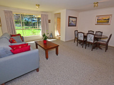 10A Main St Robertson NSW 2577 CENTRALLY LOCATED SPACIOUS HOME TO SUIT EVERYONE IN THE FAMILY ! First time on the market since built 1998, all the family will feel at home here with features to accomodate a myriad of interests. Set discreetly back from the street, the entrance portico opens out into a large formal living/dining room - or perhaps the 'parents' retreat. Step into the open plan kitchen, with long servery bench + loads of cupboards and adjacent informal dining area - or potential office spot - where the warmth of the enormous slow combustion fireplace will ensure the children are comfy in front of the wall mounted TV. The master bedroom with ensuite, walk-in-robe and bay window feature, is bathed in eastern light for your easy start to the morning. 3 other bedrooms are clustered around the main bathroom with separate shower & bath & completely separate toilet. For the gardener, the back yard boasts enclosed veggie beds ready to be rejuvenated and another fruit tree enclosure...with still plenty of room for outdoor entertaining under the covered nook just outside the kitchen windows or beside the large workshed/home hobbyist 'hideout'. Just the thing for a home gym, artist studio or 'kids' retreat' for peace and quiet. Many different varieties of flowering shrubs, amidst well established Tree Ferns, will delight all year round and add a layer of privacy to the perimeters. Other features include internal access to the double garage (which has a single roller door for access at the rear), internal laundry with external door to the clothes line, this home only needs 'your touch' for comfort and convenience for your family to grow in the community friendly atmosphere of Robertson village.