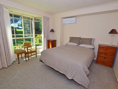 10A Main St Robertson NSW 2577 CENTRALLY LOCATED SPACIOUS HOME TO SUIT EVERYONE IN THE FAMILY ! First time on the market since built 1998, all the family will feel at home here with features to accomodate a myriad of interests. Set discreetly back from the street, the entrance portico opens out into a large formal living/dining room - or perhaps the 'parents' retreat. Step into the open plan kitchen, with long servery bench + loads of cupboards and adjacent informal dining area - or potential office spot - where the warmth of the enormous slow combustion fireplace will ensure the children are comfy in front of the wall mounted TV. The master bedroom with ensuite, walk-in-robe and bay window feature, is bathed in eastern light for your easy start to the morning. 3 other bedrooms are clustered around the main bathroom with separate shower & bath & completely separate toilet. For the gardener, the back yard boasts enclosed veggie beds ready to be rejuvenated and another fruit tree enclosure...with still plenty of room for outdoor entertaining under the covered nook just outside the kitchen windows or beside the large workshed/home hobbyist 'hideout'. Just the thing for a home gym, artist studio or 'kids' retreat' for peace and quiet. Many different varieties of flowering shrubs, amidst well established Tree Ferns, will delight all year round and add a layer of privacy to the perimeters. Other features include internal access to the double garage (which has a single roller door for access at the rear), internal laundry with external door to the clothes line, this home only needs 'your touch' for comfort and convenience for your family to grow in the community friendly atmosphere of Robertson village.