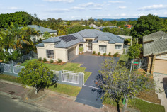 24 Clipper Blvd Clear Island Waters QLD 4226 Show Piece Single Level Home Welcome to this well built, 5 bedroom, 2 bathroom single level home that is within the prestigious, sought-after Moorings precinct of Clear Island Waters. Perfectly situated on an elevated 787m2 rectangular allotment, this property has not only great street appeal but it also has the room to expand and add a granny flat or more car accommodation to the front of the property (subject to council approval). Feel rest assured as waterfront neighboring properties ensure your home’s value is protected. Step inside and discover a flexible floor plan, allowing for both privacy and entertaining, this property boasts a formal and informal living area to cater for families of all size. With a recently upgraded sleek white kitchen, featuring plenty of storage space, double entry, a Miele oven and stainless steel appliances. Don’t miss this rare opportunity to secure a home in the most tightly held suburb on the Gold Coast, Clear Island Waters. Close to shopping centers such as Pacific Fair and Robina Town Centre, Q Super Centre, cafes and some of Gold Coast’s most sought-after schools such as All Saints and Somerset College. Recently upgraded including new internal paint throughout, new engineered timber flooring in all living areas and new landscaped gardens. Features at a glance ✓ 5 spacious bedrooms and 2 bathrooms ✓ Specifically designed to aid a low-maintenance lifestyle, allowing time for the finer things in life. ✓ Ducted Air Conditioning. ✓ 6 Panel Solar System. ✓ Generous two living areas internally and a large outdoor entertaining area. ✓ Updated sleek white kitchen featuring your very own bar. ✓ Fully fenced with electric gate, perfect for those with children or pets. ✓ Double garage with extra storage space and a work bench area. ✓ Close to all facilities and amenities that make Clear Island Waters the place to be.