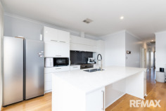 46 Aureate Way Eglinton WA 6034 750,000 Coastal Elegance Meets Everyday Luxury – Walk to the Beach, Dine by the Ocean, Love Where You Live Perfectly positioned in the highly sought-after coastal community of Amberton Beach, this beautifully presented home offers the ideal blend of modern comfort, quality craftsmanship, and an enviable beachside lifestyle. Just a short stroll from the pristine shoreline and the ever-popular The Amberton Beach Bar & Kitchen, you'll enjoy breathtaking panoramic ocean views, delicious meals, and unforgettable sunsets that make every evening feel like a holiday. Amberton Beach is renowned for its welcoming community atmosphere, expansive parklands, walking trails, and family-friendly lifestyle. With the Mitchell Freeway extension, train station, newly opened shopping centre, and excellent schools all just minutes away, you'll enjoy the perfect balance of coastal tranquility and everyday convenience. From the moment you arrive, this home impresses with its striking street appeal, low-maintenance front gardens, feature entry door complete with a security flyscreen, and ample street parking for family and guests. Step inside to discover soaring ceilings, quality skirting boards and cornices, and beautiful wood-effect laminate flooring that flows seamlessly throughout the home, creating a warm and sophisticated coastal ambience. Designed for comfortable living and effortless entertaining, the spacious open-plan living, dining, and kitchen area forms the heart of the home. Bathed in natural light, this inviting space extends effortlessly through sheer curtains to the impressive alfresco entertaining area. Featuring a raised roof and a stunning whitewashed feature wall, the outdoor living space perfectly captures the relaxed coastal charm that Amberton Beach is famous for. The kitchen is a true showpiece, combining style with functionality. A generous island bench finished with elegant white stone benchtops provides the perfect gathering place for family and friends, while an abundance of quality cabinetry above and below the benchtops ensures exceptional storage. Complete with a dishwasher, 900mm oven, five-burner cooktop, and a double-door fridge recess, this kitchen is designed to impress both home cooks and entertainers alike. The king-sized master suite is a luxurious private retreat featuring French plantation shutters, a spacious walk-in robe, and a beautifully renovated ensuite finished to a high standard. Bedrooms two and three continue the home's quality theme with laminate flooring, double mirrored sliding robes, and elegant French plantation shutters. The stylishly renovated family bathroom has also been tastefully updated, while both bathrooms have been professionally epoxy grouted, providing peace of mind with an impressive 25-year warranty. Practicality has not been overlooked, with a well-appointed laundry featuring a separate toilet and linen recess, a fully enclosed double garage, and a low-maintenance backyard allowing you to spend more time enjoying the coastal lifestyle rather than maintaining the garden. Comfort is assured year-round thanks to the reverse-cycle ducted and zoned air conditioning system, while the 6.6kW solar panel system helps keep energy costs down. Security is enhanced with two surveillance cameras, positioned at the front of the home and the alfresco area, both connected to a DVR recording system. This is more than just a home—it's an opportunity to embrace one of Perth's most desirable coastal lifestyles, where morning beach walks, afternoon swims, and spectacular sunsets become part of your everyday routine. If you've been searching for a home that offers quality finishes, thoughtful upgrades, low-maintenance living, and an unbeatable beachside location, this stunning Amberton Beach residence is one you simply cannot afford to miss. Arrange your inspection today and discover why so many people are proud to call this exceptional coastal community home.