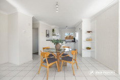 Unit 17/15 Tenison-Woods Cct Tenison Point Bonython ACT 2905 $479,000 - $499,000 The Perfect Balance of Nature and Convenience Set within the peaceful boutique 'Tenison Point' complex of just 18 residences, this newly refreshed top-floor apartment enjoys Brindabella Range views and a location moments from Lake Tuggeranong, Tuggeranong Town Centre and an array of beautiful outdoor spaces. Offering a low-maintenance lifestyle where nature and convenience come together, it's an ideal opportunity for first home buyers, downsizers and investors alike. THE HOME Thoughtfully designed and newly refreshed, this light-filled top-floor apartment offers generous proportions and a practical floorplan ready to be enjoyed. The spacious open plan living and dining area provides flexibility to relax or entertain, while elevated positioning fills the home with natural light and captures Brindabella Range views. A large private balcony offers a peaceful setting to enjoy your morning coffee or unwind at the end of the day. At the heart of the home, the well-appointed kitchen features generous storage, ample bench space and new appliances, making everyday cooking and entertaining a pleasure. Both bedrooms are generously sized with new carpets and built-in robes, while the main bedroom enjoys convenient ensuite access to the spacious bathroom, complete with a spa bath and separate toilet. Freshly painted throughout and fitted with new roller blinds, the apartment also includes electric heating and a European-style laundry. A spacious single garage with an automatic door and additional visitor parking complete the offering, all within the peaceful 'Tenison Point' complex. THE LOCATION Life here is defined by connection - to nature, recreation and convenience. Spend your weekends exploring the nearby Murrumbidgee River Corridor, walking and cycling scenic trails, or simply enjoying the surrounding bushland and ever-changing Brindabella Range views. Despite its peaceful setting, everyday essentials are close at hand. Lake Tuggeranong, South Point Shopping Centre, cafés, restaurants, public transport and key employment hubs are all within easy reach, making it easy to enjoy the best of both relaxed living and urban convenience. HIGHLIGHTS Top-floor apartment with Brindabella views Newly refreshed and ready to be enjoyed Boutique 'Tenison Point' complex of only 18 residences Spacious open plan living and dining Excellent natural light throughout Well-appointed kitchen with generous storage and new appliances Two large bedrooms with new carpets and built-in robes Main bedroom with ensuite access to bathroom Spacious bathroom with spa bath and separate toilet European style laundry Freshly painted interior New roller blinds Electric heating Large private balcony Spacious single garage with power door and visitor parking Close to Lake Tuggeranong, South Point Shopping Centre and major employers Easy access to the Murrumbidgee River Corridor, nature trails and outdoor recreation DETAILS Floor: Top floor (level 2) Living area: 92m2 Balcony: 12m2 Garage: 19.8m2 Total: 123.8m2 Strata: $848 per quarter Rates: $579 per quarter Rent estimate: $520 - $540 per week EER: 5.5 All figures are approximate For further details, please contact Jonathan Irwin by calling 0421 040 082 or by email jonathan@irwinproperty.com.au