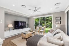 52 Taunton Cct Upper Kedron QLD 4055 Hamptons Elegance Opposite Peaceful Nature Corridor Positioned in a quiet, family-friendly street and enjoying a peaceful outlook across a leafy nature corridor, this beautifully presented residence offers a refined take on modern family living. Thoughtfully designed and impeccably maintained, 52 Taunton Circuit combines timeless style with everyday functionality in one of Upper Kedron's most desirable pockets. Beyond the welcoming façade, the interiors reveal a light-filled layout enhanced by elegant finishes and classic detailing. Plantation shutters, warm timber accents and shaker-style cabinetry create a sense of understated sophistication throughout the home. At the heart of the residence, the kitchen has been designed for both practicality and connection. Featuring an induction cooktop, expansive bench space and a generous butler's pantry, it seamlessly anchors the open plan living and dining areas. Custom built-in cabinetry and integrated speakers elevate the living zone, creating a comfortable space for both quiet evenings and entertaining with family and friends. Large sliding doors fitted with Crimsafe security screens allow fresh breezes to flow through the living spaces while providing peace of mind and security. A dedicated study provides an ideal environment for those working from home, while the downstairs powder room offers additional convenience for guests. Upstairs, four spacious bedrooms provide excellent separation for family living. The master retreat offers a peaceful sanctuary complete with its own private balcony, walk-in robe and beautifully appointed ensuite. The main bathroom is equally impressive, highlighted by a freestanding bath designed for relaxation at the end of the day. Outdoor living is equally appealing, with a covered alfresco overlooking the manicured, irrigated gardens - a perfect setting for weekend gatherings or relaxed afternoons with family. With the added benefits of solar power, Crimsafe security doors and established landscaping, the home balances comfort, style and efficiency. Features you'll appreciate: - Classic Hamptons-inspired detailing with shaker cabinetry - Well-appointed kitchen with induction cooktop and butler's pantry - Custom built-in entertainment cabinetry and integrated speakers - Plantation shutters and solar system - Crimsafe security doors for added safety and airflow - Four generous bedrooms plus a dedicated home office - Private master suite with balcony, walk-in robe and ensuite - Elegant main bathroom with freestanding bath - Powder room on the ground level - Covered alfresco overlooking landscaped, irrigated gardens - Peaceful position opposite a leafy nature corridor Why families love Upper Kedron: - Quiet, leafy streets surrounded by natural bushland - Walking trails, parklands and bike paths throughout the suburb - Close proximity to quality schools and childcare centres - Easy access to Ferny Grove train station and city-bound transport - Just 12km from Brisbane CBD - A welcoming, community-focused neighbourhood Offering timeless design, modern comfort and a tranquil natural outlook, this home delivers an exceptional lifestyle opportunity in one of Upper Kedron's most sought-after locations.