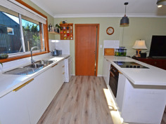 35 Shackleton St Robertson NSW 2577 PLENTY OF ROOM & PRIVATELY POSITIONED FAMILY HOME ON APPROX 1330SQM You'll only see the hedge rimmed drive into No 35 until the block opens out at the gateway to a wide fully fenced expanse - park the weekender van or tradie's truck within eyesight. The comfortable home is well sited with a large secure front yard for the children & pets to play safely and also offers access either side to the north facing rear garden. The entry hall leads into an open plan living, kitchen & dining area with loads of light through large windows north and south. The kitchen features a wide servery (or preparation) bench perfect for the quick brekkie or evening drinks whilst dinner is on the way with the dining table close by. The main bedroom is off to the right with a partial wall of robes to disguise the cutest ensuite. The western side of the home has a spacious 3-way main bathroom with 3 more bedrooms for the growing family. The internal laundry doubles as a butler's pantry with easy access outside. The very private rear garden is bathed in northern sun with a rural outlook towards the 5 acre lots that front onto Lemmons Road - not likely to be built out - and also features a 'guest shed' with high ceilings to living area, separate bedroom + ensuite. Beautifully styled and quite the retreat ! PRIVACY, SPACE & IN A QUIET PLACE...come see me.